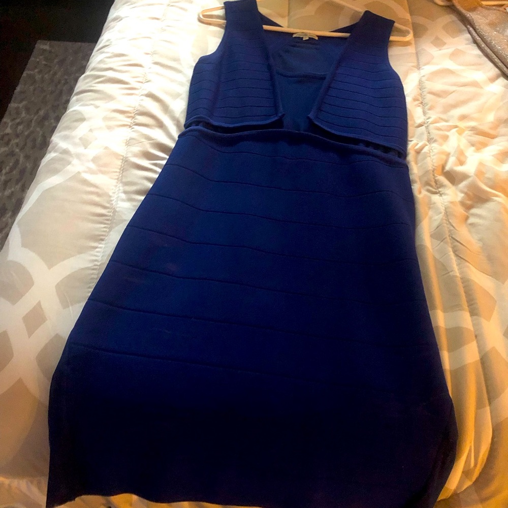 Blue bandage dress worn to go clubbing
